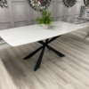 White Stone Top Dining Table with Matte Black Steel Cross Legs